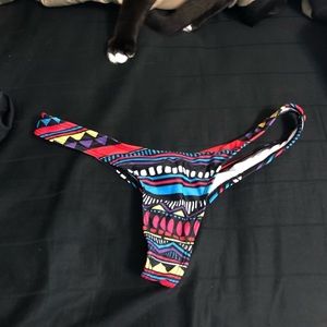 Thong patterned swim bottoms